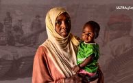 امرأة تحمل طفلها خلال حرب السودان