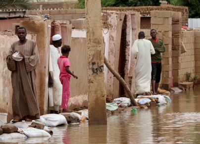 بيوت مهدمة جراء السيول والأمطار في السودان