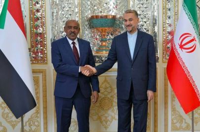 وزير الخارجية السوداني ونظيره الإيراني 