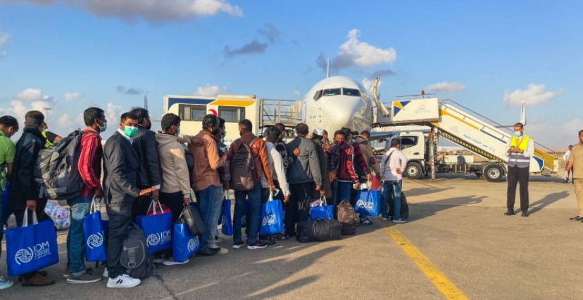 عودة طوعية لمهاجرين من ليبيا