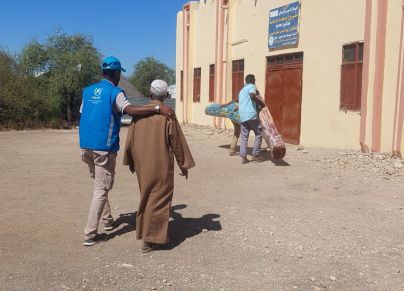 نازح سوداني وموظف مفوضية اللاجئين